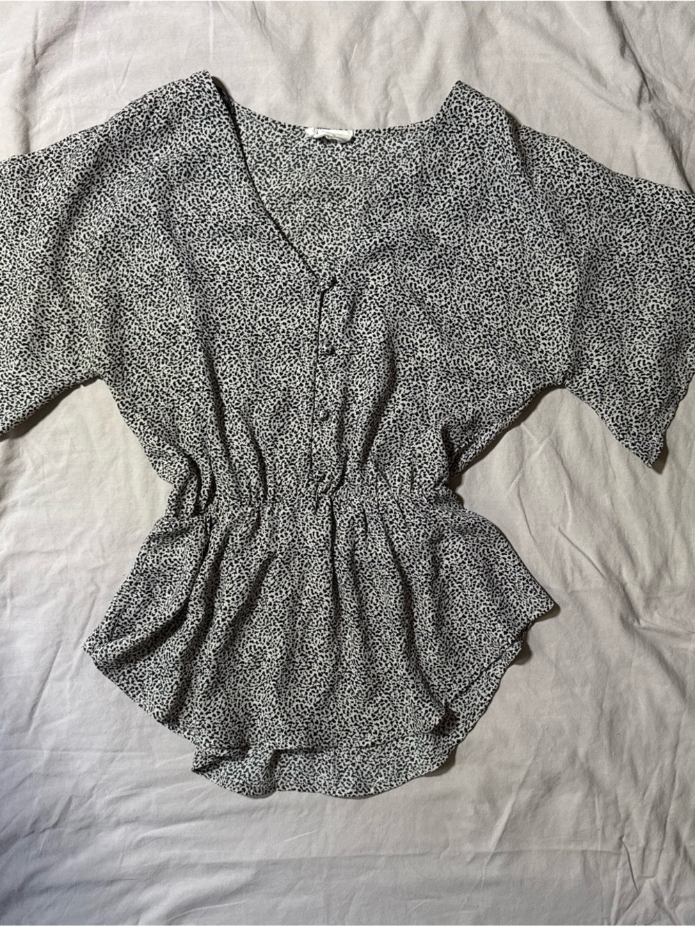 Sienna Sky Black and White V-Neck Cinched-Waist Blouse